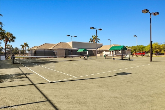 9200 Highland Woods Blvd Unit 1309, Bonita Springs, FL 34135 - view of sport court featuring fence
