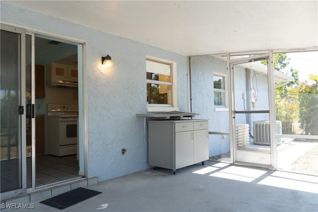 view of patio with central AC unit