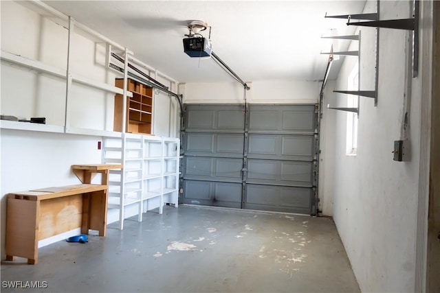 garage featuring a garage door opener