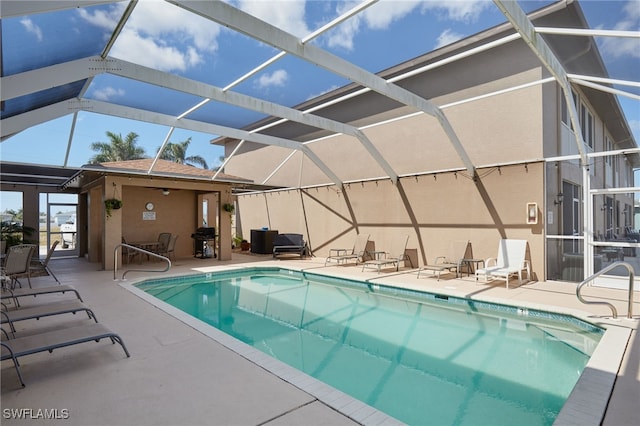1315 SW 47th Ter Unit 102, Cape Coral, FL 33914 - outdoor pool with a patio area and glass enclosure