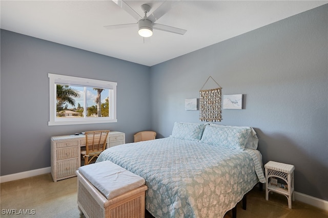 1315 SW 47th Ter Unit 102, Cape Coral, FL 33914 - carpeted bedroom featuring baseboards and a ceiling fan