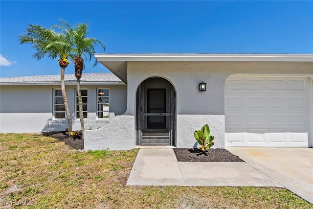 6874 Carmelle Dr, Fort Myers, FL 33919 - entrance to property with stucco siding, a yard, and a garage