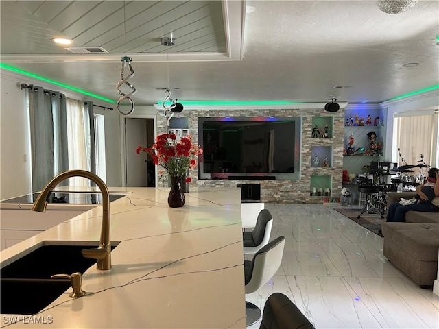 dining space featuring visible vents and marble finish floor