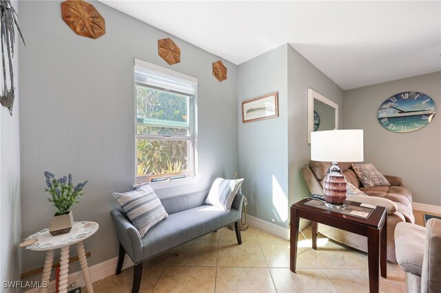 829 W Elkcam Cir Unit 2-106, Marco Island, FL 34145 - living area with baseboards and light tile patterned floors