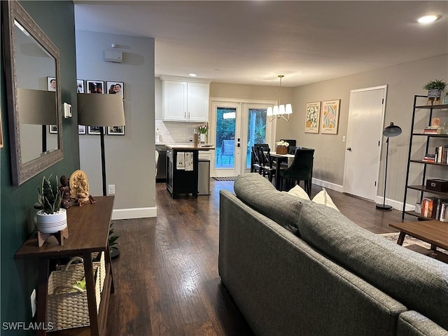 living room featuring baseboards, recessed lighting, and dark wood-style floors