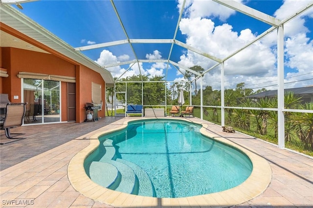 18510 Ellen Ave, Port Charlotte, FL 33948 - pool featuring a lanai, a patio, and area for grilling