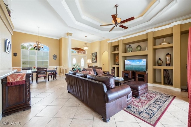 18510 Ellen Ave, Port Charlotte, FL 33948 - living area with a healthy amount of sunlight, ornamental molding, built in shelves, and light tile patterned floors
