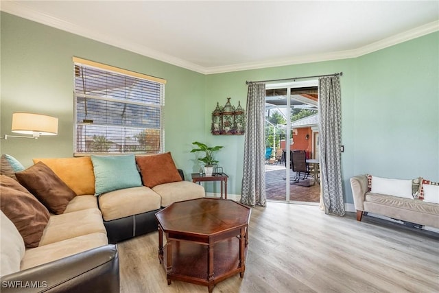 18510 Ellen Ave, Port Charlotte, FL 33948 - living room featuring crown molding, baseboards, and wood finished floors