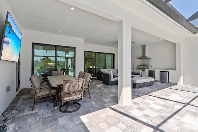 9974 Winterview Dr, Naples, FL 34109 - view of patio with an outdoor hangout area and outdoor dining area