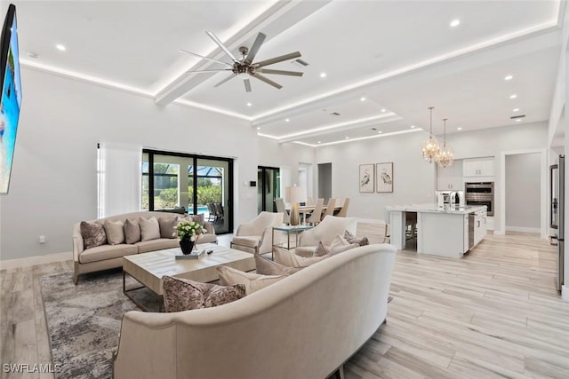 9974 Winterview Dr, Naples, FL 34109 - living room with recessed lighting, baseboards, a ceiling fan, beamed ceiling, and light wood-type flooring