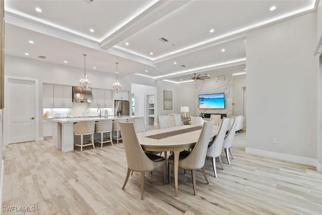 9974 Winterview Dr, Naples, FL 34109 - dining room featuring recessed lighting, ceiling fan, a chandelier, light wood-style flooring, and beam ceiling