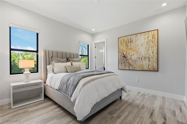 9974 Winterview Dr, Naples, FL 34109 - bedroom with recessed lighting, baseboards, and light wood finished floors