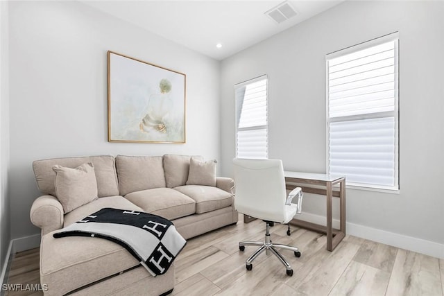 9974 Winterview Dr, Naples, FL 34109 - home office with wood finished floors, baseboards, and recessed lighting