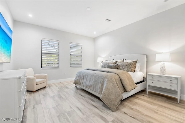 9974 Winterview Dr, Naples, FL 34109 - bedroom with light wood-style flooring, baseboards, and recessed lighting