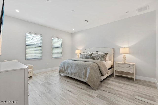 9974 Winterview Dr, Naples, FL 34109 - bedroom featuring baseboards, light wood-type flooring, and recessed lighting