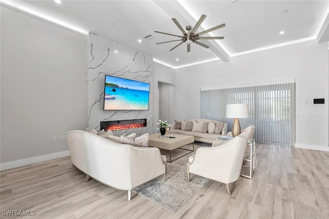 9974 Winterview Dr, Naples, FL 34109 - living area featuring a ceiling fan, a fireplace, light wood finished floors, recessed lighting, and baseboards