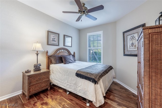 4660 Winged Foot Ct Unit 102, Naples, FL 34112 - bedroom with ceiling fan, baseboards, and wood finished floors