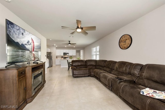 8813 Swell Brooks Ct, North Fort Myers, FL 33917 - living area with a ceiling fan, light tile patterned floors, and recessed lighting