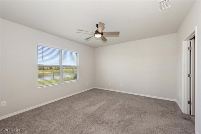 8813 Swell Brooks Ct, North Fort Myers, FL 33917 - carpeted spare room with a ceiling fan and baseboards