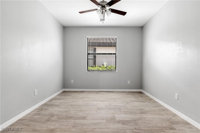 19874 Beverly Park Rd, Estero, FL 33928 - spare room with ceiling fan and baseboards