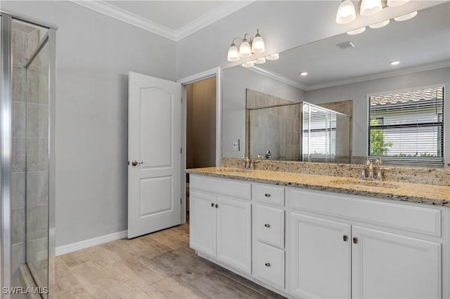 19874 Beverly Park Rd, Estero, FL 33928 - full bathroom featuring double vanity, crown molding, a shower stall, a sink, and baseboards