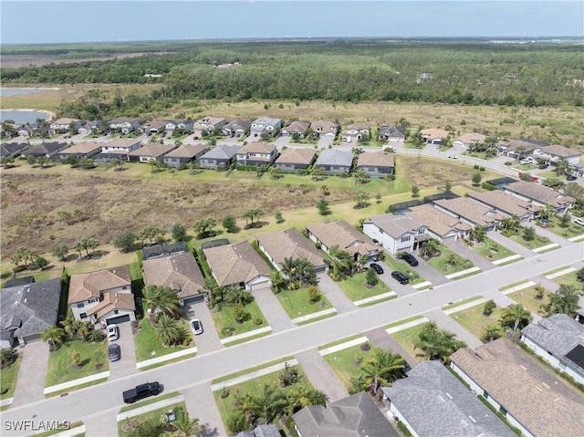 19874 Beverly Park Rd, Estero, FL 33928 - birds eye view of property featuring a residential view, a view of trees, and a water view