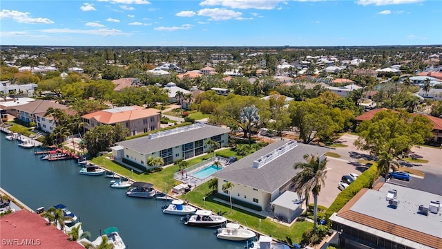 bird's eye view with a water view and a residential view