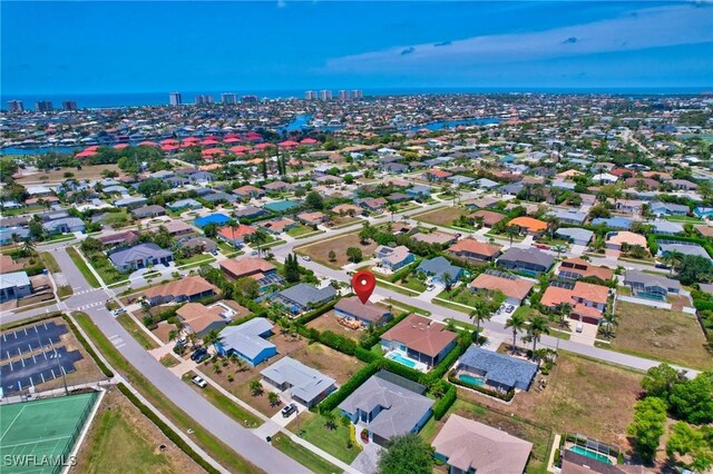 1357 Merrimac Ave, Marco Island, FL 34145 - bird's eye view featuring a water view, a city view, and a residential view
