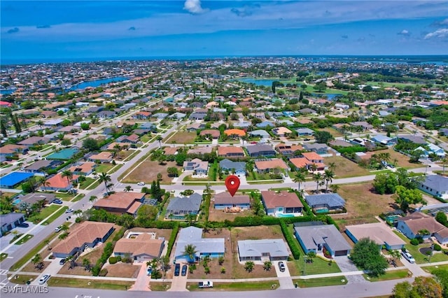 1357 Merrimac Ave, Marco Island, FL 34145 - bird's eye view featuring a water view and a residential view