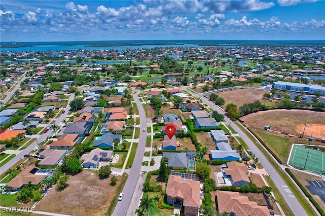 1357 Merrimac Ave, Marco Island, FL 34145 - bird's eye view featuring a water view and a residential view