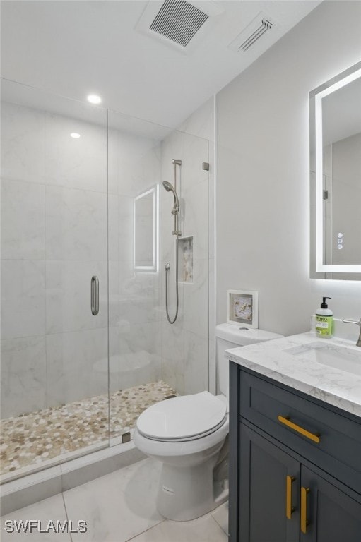 1357 Merrimac Ave, Marco Island, FL 34145 - full bathroom featuring tile patterned floors, toilet, visible vents, and a shower stall