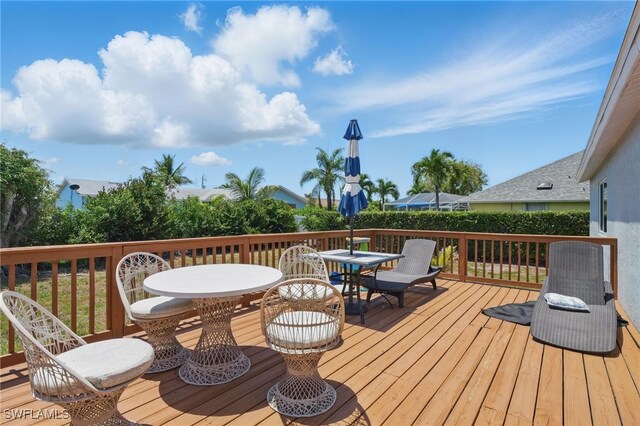1357 Merrimac Ave, Marco Island, FL 34145 - deck with outdoor dining area