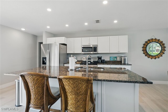 1357 Merrimac Ave, Marco Island, FL 34145 - kitchen featuring baseboards, stainless steel appliances, a kitchen island with sink, and recessed lighting