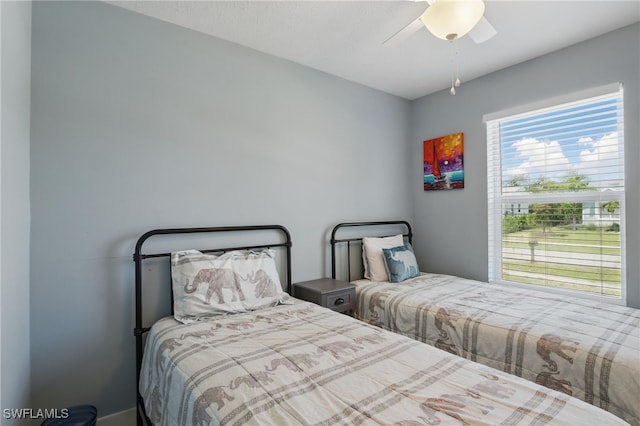 1357 Merrimac Ave, Marco Island, FL 34145 - bedroom with multiple windows and ceiling fan