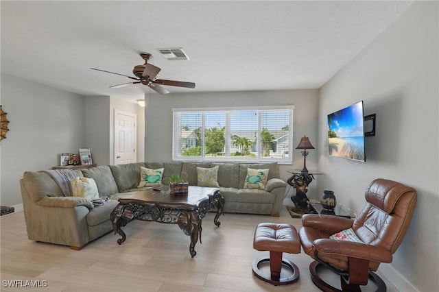1357 Merrimac Ave, Marco Island, FL 34145 - living room with baseboards, light wood-style floors, visible vents, and ceiling fan
