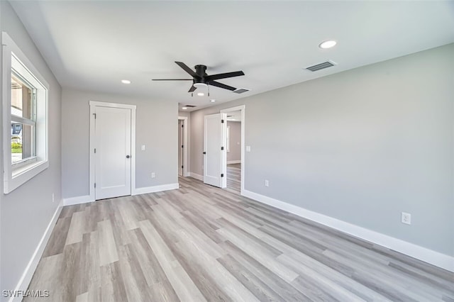446 Lake Murex Cir, Sanibel, FL 33957 - unfurnished bedroom with visible vents, recessed lighting, light wood-style floors, and baseboards