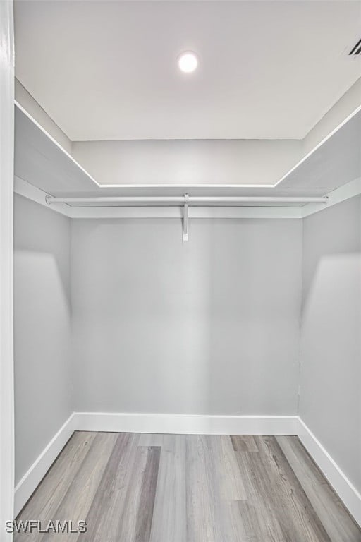 446 Lake Murex Cir, Sanibel, FL 33957 - spacious closet featuring wood finished floors