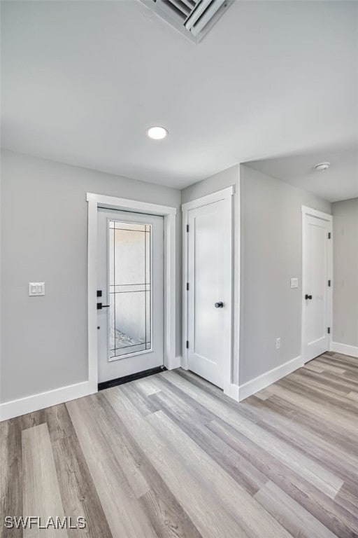 446 Lake Murex Cir, Sanibel, FL 33957 - foyer entrance featuring recessed lighting, baseboards, and light wood-type flooring