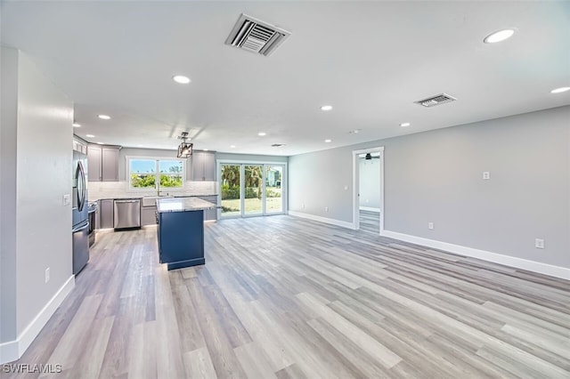 446 Lake Murex Cir, Sanibel, FL 33957 - kitchen featuring appliances with stainless steel finishes, recessed lighting, baseboards, backsplash, and visible vents