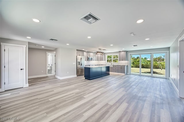 446 Lake Murex Cir, Sanibel, FL 33957 - kitchen with recessed lighting, baseboards, appliances with stainless steel finishes, and visible vents