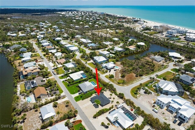 446 Lake Murex Cir, Sanibel, FL 33957 - bird's eye view featuring a water view and a residential view