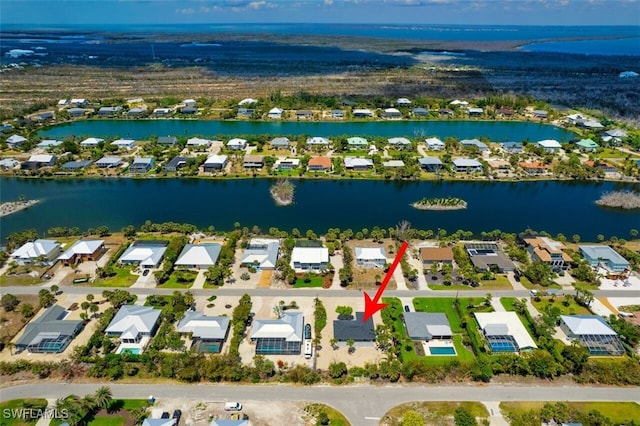 446 Lake Murex Cir, Sanibel, FL 33957 - birds eye view of property with a water view and a residential view