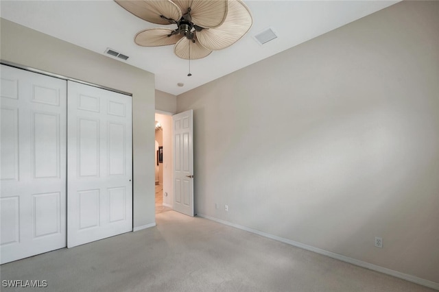 317 Harvard Ln, Naples, FL 34104 - unfurnished bedroom with carpet floors, baseboards, a closet, and ceiling fan