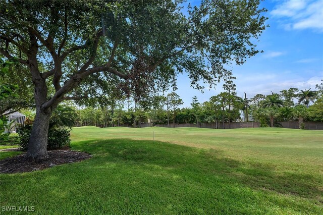317 Harvard Ln, Naples, FL 34104 - view of green lawn featuring view of golf course