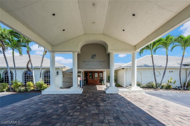 317 Harvard Ln, Naples, FL 34104 - view of patio / terrace with french doors
