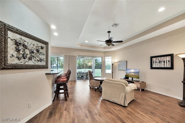 317 Harvard Ln, Naples, FL 34104 - living area with recessed lighting, a ceiling fan, wood finished floors, baseboards, and a raised ceiling