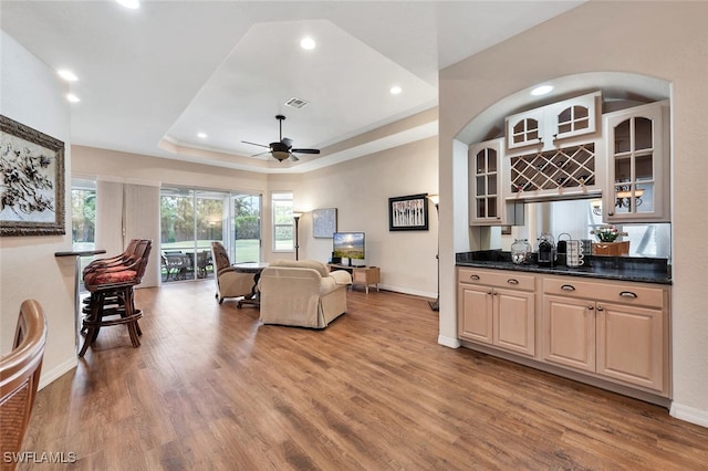 317 Harvard Ln, Naples, FL 34104 - living area featuring bar with sink, baseboards, wood finished floors, and recessed lighting