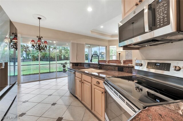 317 Harvard Ln, Naples, FL 34104 - kitchen with appliances with stainless steel finishes, a sink, a chandelier, light brown cabinetry, and recessed lighting