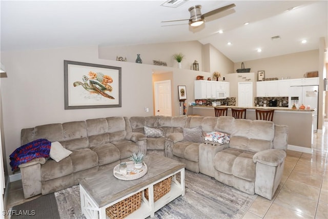 2049 NE 27th Ter, Cape Coral, FL 33909 - living area featuring visible vents, ceiling fan, high vaulted ceiling, and light tile patterned flooring