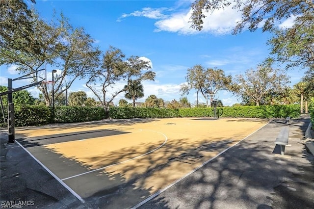 exterior space featuring community basketball court